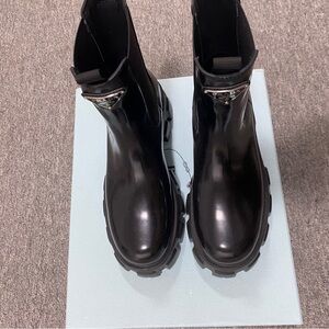 Prada Black Ankle Boots with Silver Accent